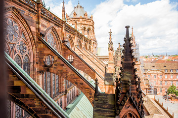 View on the spires of the main cathedral in Strasbourg city in France - obrazy, fototapety, plakaty