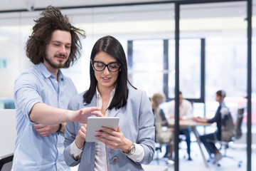 Business People Working With Tablet in startup office