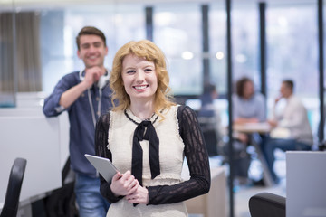 Business People Working With Tablet in startup office