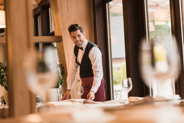 waiter serving tables
