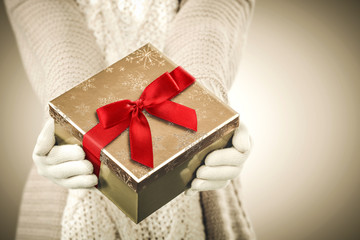 Christmas gifts in woman hands. 