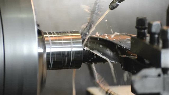 Drilling a deep hole of large diameter. When drilling, a lubricating-cooling liquid is supplied.