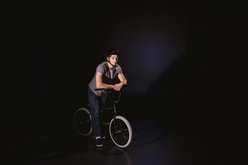 Fototapeta na wymiar young cyclist with bmx bicycle