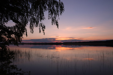 Obraz na płótnie Canvas Sunset over lake