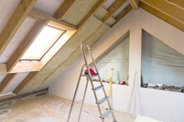 Attic renovation and thermal Insulation with mineral rock wool - obrazy, fototapety, plakaty