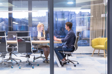 Startup Business Team At A Meeting at modern office building