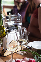 Wine tasting. Wine is poured into the glass.
