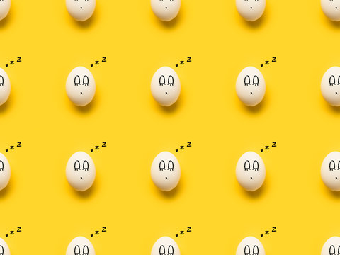 Painted chicken eggs with sleeping emoji