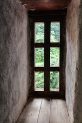 Blurry background view from Trongsa Dzong windows.