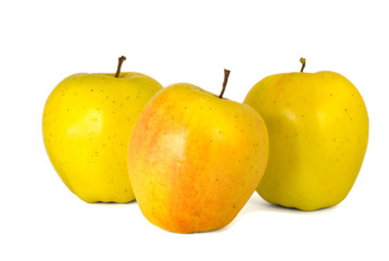 a group of yellow apples isolate on a white background