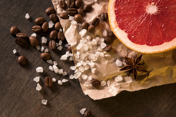 grapefruit coffee beans anise cinnamon and sugar is scattered on the paper