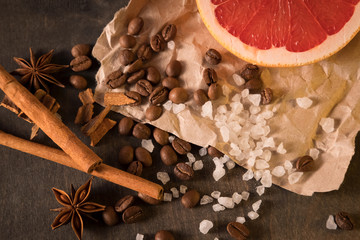 grapefruit coffee beans anise cinnamon and sugar is scattered on the paper
