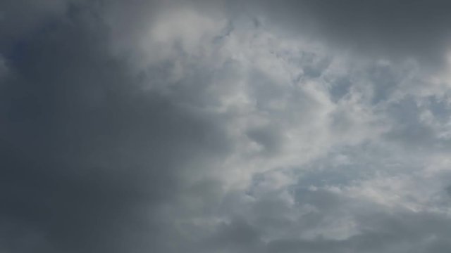 Tropical weather system cloudscape with light cloud formations and blue skies high definition time lapse footage.	