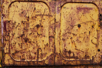 metallic yellow rusty door