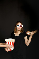 Obraz premium woman with bucket of popcorn