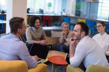 Startup Business Team At A Meeting at modern office building