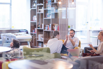 Startup Business Team At A Meeting at modern office building