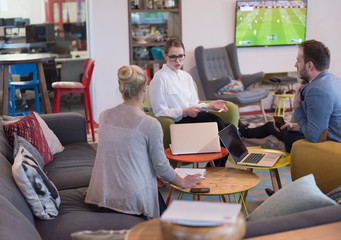 Startup Business Team At A Meeting at modern office building