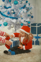 Obraz premium Christmas happy child with bear and gift, cyber monday.