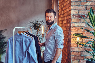 A man fit on fashionable shirts.