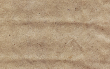 Old creased recycled paper texture background 