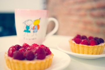 carrot cake with walnuts, prunes and dried apricots on a dark wood background. tinting. selective focus