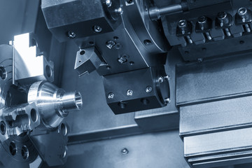 CNC lathe machine (Turning machine) cutting the metal  cone shape part .Hi-precision CNC machining...
