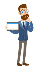 Hipster Businessman holding tablet PC and standing with his finger to his lips