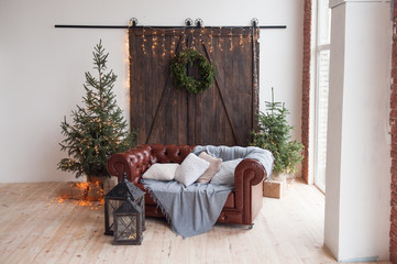 Christmas and New Year decorated interior room with presents and New year tree