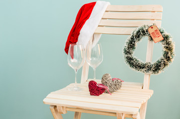 Santa hat, hearths and wine glasses