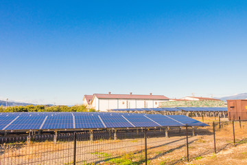 Solar power panels ,Photovoltaic modules for innovation green energy for life with blue sky background.