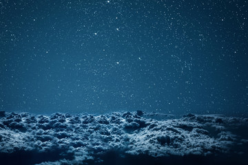 backgrounds night sky with stars  and clouds.
