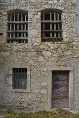 Fototapeta na wymiar A derelict building in hill village of Erto in Friuli Venezia Giulia, north east Italy 