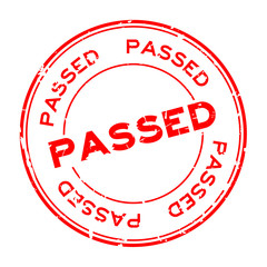 Grunge red passed round rubber seal stamp on white background