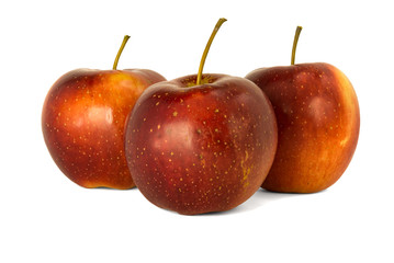 red ripe bright apples on a white isolated background
