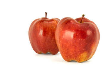 red ripe bright apples on a white isolated background
