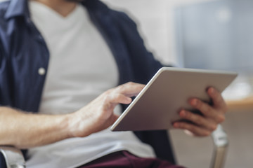 Man Using Tablet