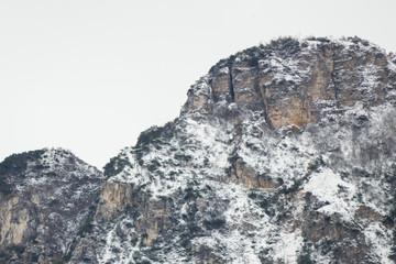 Aerial view on the top of mountain covered in snow, Trentino, Italy, Europe