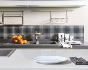 Fototapeta na wymiar grey sink and modern kitchen style