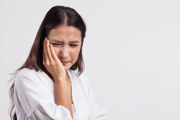 woman suffering from toothache, tooth decay or sensitivity