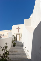 Fototapeta na wymiar Stairs up to the church in Fira, Santorini
