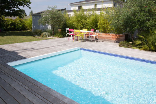cheerful pool in home house garden in summer