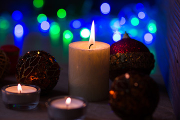 Decoration for Christmas and New Year. Xmas day. Candles and shining decorations. 
