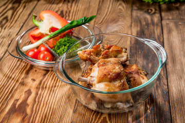 The rabbit baked in an oven in red sauce