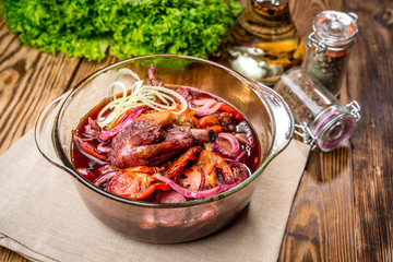 Braised rabbit with rosemary, garlic and juniper berries