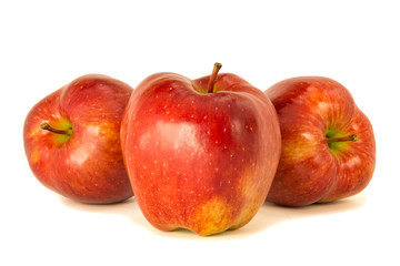 red ripe bright apples on a white isolated background