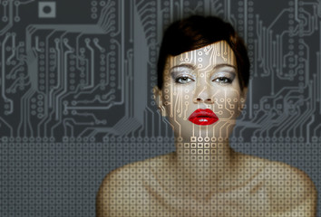 AI (Artificial Intelligence) concept - women portrait with printed circuit board