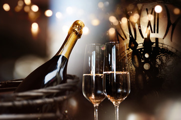Congratulations for new year with champagne and clock