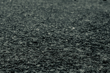 Close up black asphalt road texture background.