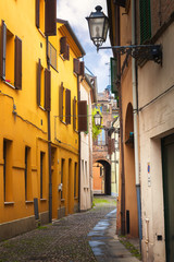 Obraz premium Ferrara, old narrow street, Italy